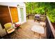 Cozy deck area with outdoor seating, perfect for relaxing and enjoying the outdoors at 6147 Pritchett Dr, Powder Springs, GA 30127