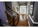 Entryway featuring hardwood floors, stairway and access to other rooms at 6147 Pritchett Dr, Powder Springs, GA 30127