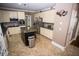 Charming kitchen featuring custom cabinets, granite countertops, and island at 6147 Pritchett Dr, Powder Springs, GA 30127