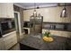 Modern kitchen featuring stainless steel appliances and central island at 6147 Pritchett Dr, Powder Springs, GA 30127