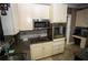 Efficient kitchen space with modern appliances and ample cabinet space at 6147 Pritchett Dr, Powder Springs, GA 30127