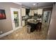 Well-lit kitchen with stainless steel appliances and center island at 6147 Pritchett Dr, Powder Springs, GA 30127