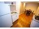 This compact kitchenette has a modern sink and stainless steel fridge and countertop burner at 6147 Pritchett Dr, Powder Springs, GA 30127