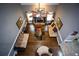 Open living room with hardwood floors, fireplace, and lots of natural light at 6147 Pritchett Dr, Powder Springs, GA 30127
