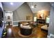 Comfortable living room with a fireplace and vaulted ceilings, creating an inviting space at 6147 Pritchett Dr, Powder Springs, GA 30127
