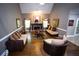 Open concept living room featuring a fireplace and comfortable seating area at 6147 Pritchett Dr, Powder Springs, GA 30127