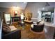 Spacious living room boasts hardwood floors, fireplace, and comfortable seating at 6147 Pritchett Dr, Powder Springs, GA 30127