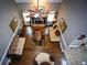 Inviting living room with fireplace, hardwood floors, ceiling fan and ample seating at 6147 Pritchett Dr, Powder Springs, GA 30127