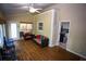 Inviting sunroom featuring hardwood floors and plenty of seating at 6147 Pritchett Dr, Powder Springs, GA 30127