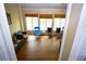Bright sunroom with hardwood floors and lots of natural light at 6147 Pritchett Dr, Powder Springs, GA 30127