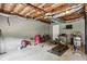 Finished basement with exercise equipment, ideal for a home gym or recreation area at 682 Leighton Way, Stone Mountain, GA 30088