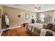 Spacious bedroom with hardwood floors and natural light at 682 Leighton Way, Stone Mountain, GA 30088
