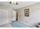 Bedroom featuring a serene sleeping space with ample closet and storage at 682 Leighton Way, Stone Mountain, GA 30088
