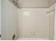Clean and classic shower with white tiled walls and shower head at 682 Leighton Way, Stone Mountain, GA 30088