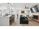 Open living space seamlessly blends the living room with modern kitchen, perfect for entertaining and Gathering life at 321 Hickory Sw Walk, Marietta, GA 30064