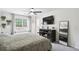 Serene main bedroom featuring a large window, modern decor, and a cozy feel at 321 Hickory Sw Walk, Marietta, GA 30064