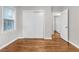 This bedroom has hardwood floors, neutral walls, closet, and a window that provides natural light at 2740 Pasco Se Ln, Atlanta, GA 30316