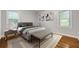 Cozy bedroom with a comfortable bed, stylish decor, and natural light at 2740 Pasco Se Ln, Atlanta, GA 30316
