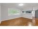 Inviting dining area with hardwood floors, connecting seamlessly to the updated kitchen at 2740 Pasco Se Ln, Atlanta, GA 30316