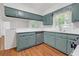 Stylish kitchen with stainless steel appliances, shaker cabinets, and light countertops at 2740 Pasco Se Ln, Atlanta, GA 30316