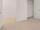 An airy room with neutral carpet and paint for versatile decorating options at 460 Reflection Dr # 21, Stockbridge, GA 30281
