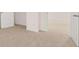 A spacious room with neutral carpet and paint for versatile decorating options at 460 Reflection Dr # 21, Stockbridge, GA 30281