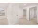 Bedroom featuring three doorways and neutral carpet at 460 Reflection Dr # 21, Stockbridge, GA 30281