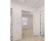 Hallway view with doorways leading to a bedroom at 460 Reflection Dr # 21, Stockbridge, GA 30281