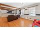 Inviting living room with hardwood floors, ceiling beams and natural light at 2944 Williams Pl, Snellville, GA 30078