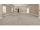 Spacious bedroom boasts neutral walls, plush carpet, and a ceiling fan at 4499 Bellemeade Dr, Douglasville, GA 30135
