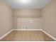 Laundry room featuring tiled floors and a wire shelf at 4499 Bellemeade Dr, Douglasville, GA 30135