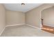 Carpeted living room featuring neutral walls and hardwood flooring in adjacent room at 4499 Bellemeade Dr, Douglasville, GA 30135