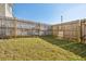Spacious fenced backyard with lawn at 5853 Greystone Dr, Lithonia, GA 30058