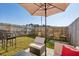 Private fenced backyard with patio and outdoor seating at 5853 Greystone Dr, Lithonia, GA 30058