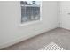 Bright bedroom with a neutral carpet and a window providing natural light at 5853 Greystone Dr, Lithonia, GA 30058