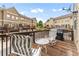 Relaxing deck space with outdoor seating and a grill, great for entertaining and enjoying the weather at 661 Village Field Nw Ct, Suwanee, GA 30024