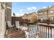 Cozy outdoor deck area with comfortable seating, ideal for relaxation and enjoying the neighborhood view at 661 Village Field Nw Ct, Suwanee, GA 30024