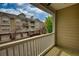 Balcony view of well-maintained condo community with manicured landscaping and brick accents at 3107 Woodland Ln, Alpharetta, GA 30009