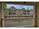 View from the private balcony overlooking a well-maintained multi-story building at 3107 Woodland Ln, Alpharetta, GA 30009