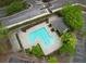 Aerial view of pool with ample seating and parking at 3107 Woodland Ln, Alpharetta, GA 30009