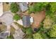 Aerial view of home and backyard featuring mature trees at 3607 Anna Nw Ln, Kennesaw, GA 30144