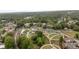 An aerial view of a park with walkways, green spaces, and recreational facilities amidst a lush, wooded environment at 3607 Anna Nw Ln, Kennesaw, GA 30144