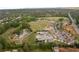 A sprawling park features a skate area, playground, green fields, and a parking lot in a lush green environment at 3607 Anna Nw Ln, Kennesaw, GA 30144