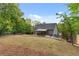 Aerial view of a backyard featuring a covered patio with backyard and trampoline at 3607 Anna Nw Ln, Kennesaw, GA 30144