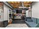 Finished basement with a treadmill, TV, and comfortable seating area at 3607 Anna Nw Ln, Kennesaw, GA 30144
