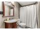 Full bathroom features a vanity sink and a shower tub combo with stylish curtain at 3607 Anna Nw Ln, Kennesaw, GA 30144