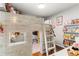 Unique bedroom with custom loft bed, built-in ladder, and whimsical decor, perfect for a  at 3607 Anna Nw Ln, Kennesaw, GA 30144