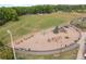 Aerial view features a vast playground area with swings, slides, and climbing structures, perfect for Gathering fun at 3607 Anna Nw Ln, Kennesaw, GA 30144