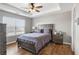 Comfortable bedroom features a ceiling fan, and a large window with natural light at 4103 Mars Bay # 25, Acworth, GA 30101