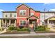Charming two-story townhome with colorful exterior, landscaped front yard, and welcoming entrance at 4103 Mars Bay # 25, Acworth, GA 30101